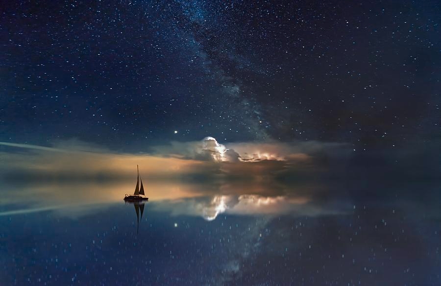 Serene night scene with a sailboat on calm water under a starry sky with the Milky Way